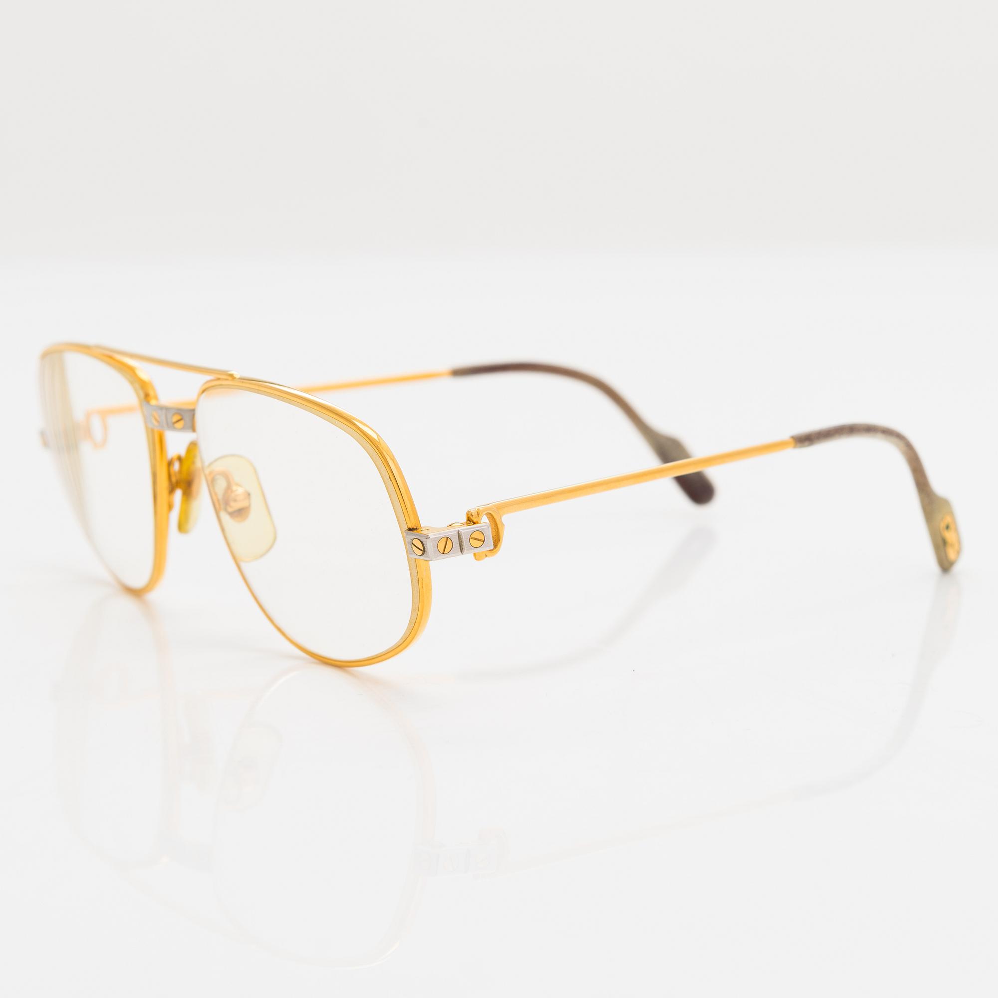 must de Cartier, Santos, Glasögonbågar. Märkta Cartier, Paris, Made in France 135, 54, 16.