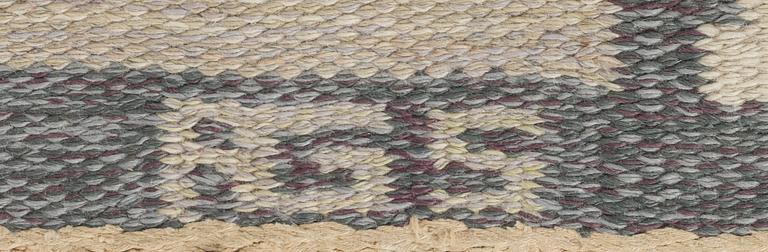 A Swedish signed flatweave carpet ca 242 x 170 cm.