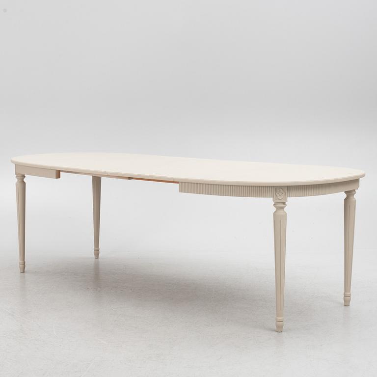 A Gustavian Style Dining Table and 10 Chairs, second half of the 20th Century.