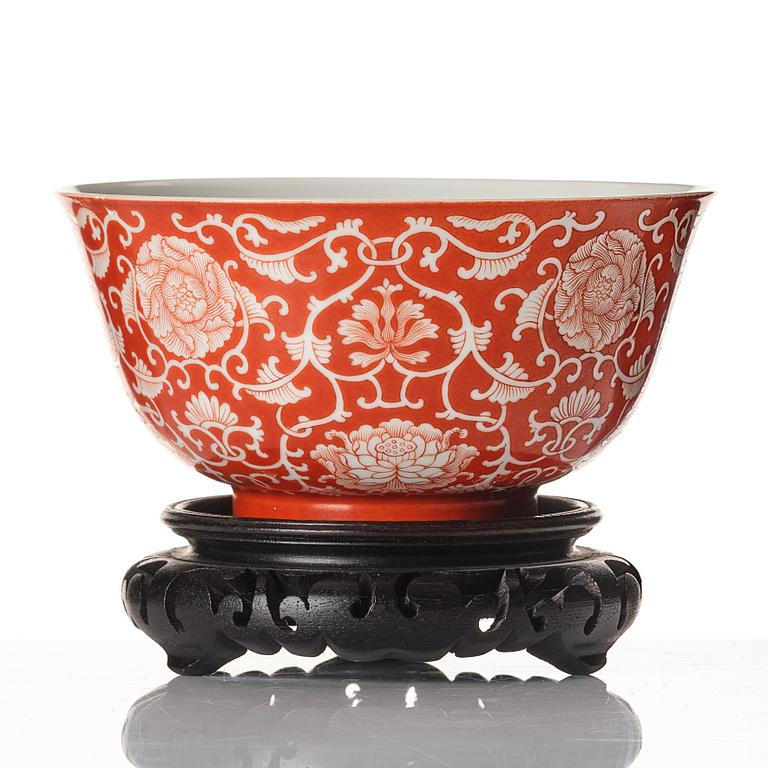 A coral red reverse decorated lotus bowl, Qing dynasty with Daoguang mark in underglaze blue.