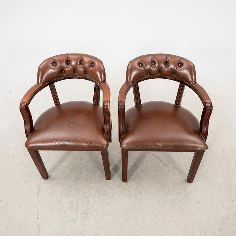 A pair of leather armchairs from the second half of the 20th century.