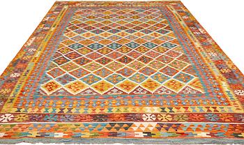 A kilim carpet, approximately 353 x 246 cm.