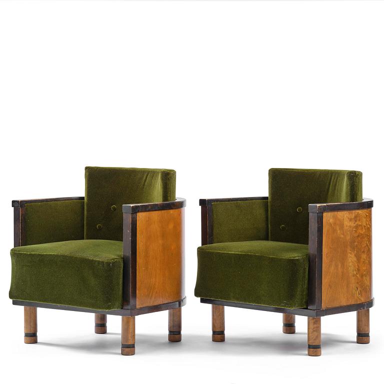 A pair of 1930s birch armchairs.