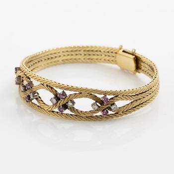 Bracelet 18K gold with diamonds and rubies.