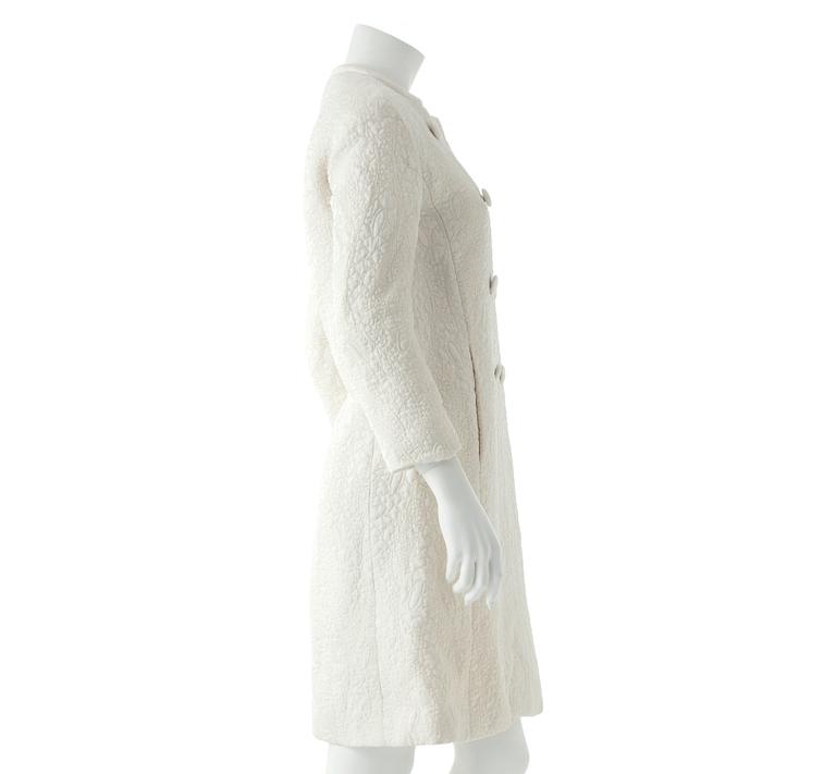 NORDISKA KOMPANIET, a white evening silkblend overcoat.