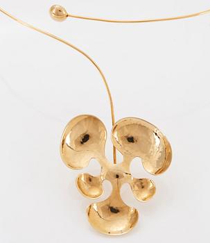 An 18K gold Wolfgang Gessl necklace.