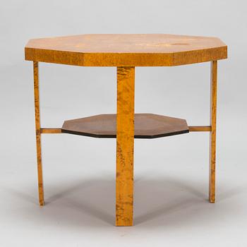 A 1920s Carelian birch veneered table.