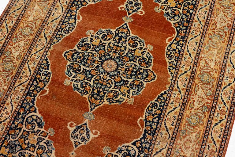 An antique 'Haj Jalili' Tabriz carpet, Northwest Persia, c. 175 x 124 cm.