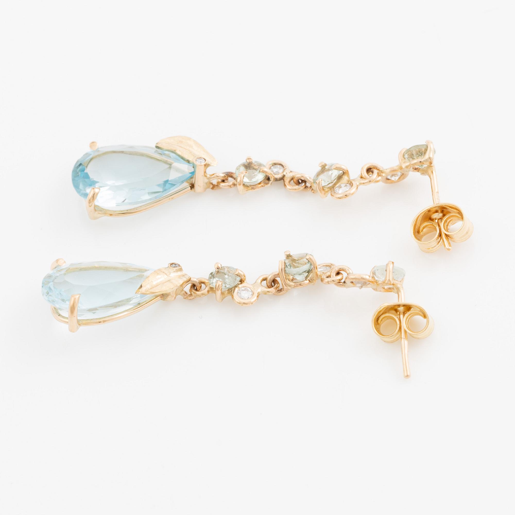 Earrings, Mandelstam, 18K gold with drop-cut blue topazes, tourmalines, and brilliant-cut diamonds.