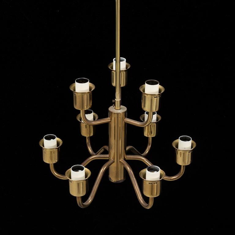 Hans-Agne Jakobsson, a late 20th century brass and glass ceiling lamp for nine lights, Markaryd, Sweden.