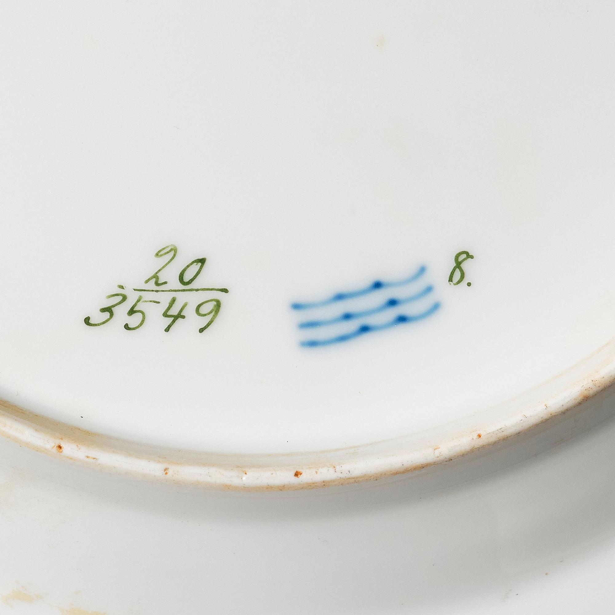 A set of nine Royal Copenhagen 'Flora Danica' dishes, Denmark, 20th Century.
