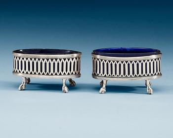 A pair of Swedish 18th century silver and glass salts, makers mark of Olof Yttraeus, Uppsala 1799.