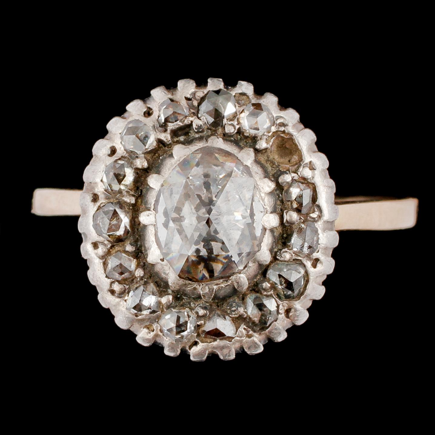 RING, 14k guld samt silver med med 15 fasettslipade diamanter, 1800-tal.