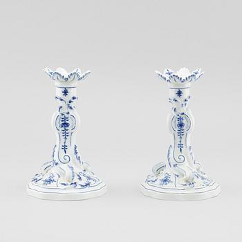 A pair of porcelain candle sticks by Meissen, second half of the 20th century.