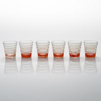 A set of 6 snapsglasses and a bottle designed by Aino Aalto for Karhula in the 1930-1940's.