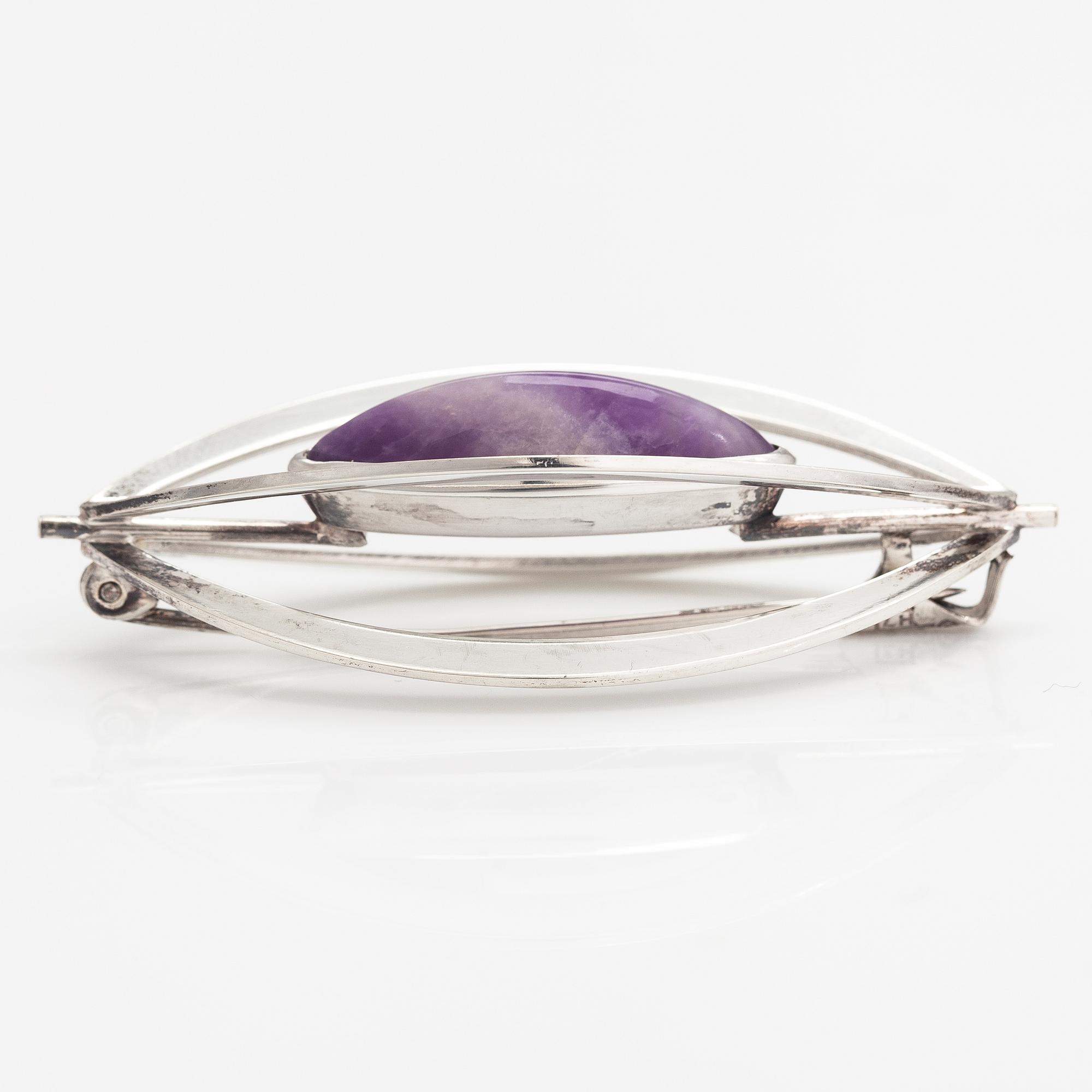 Elis Kauppi, A silver brooch/pendant with an amethyst. Kupittaan kulta, Turku 1961.