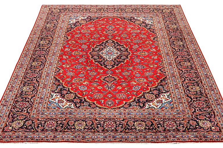 A Keshan carpet, c. 330 x 245 cm.