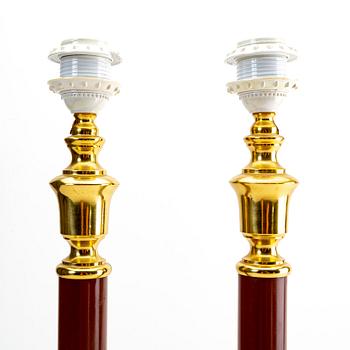 A pair of table lamps alter part of the 20th century.