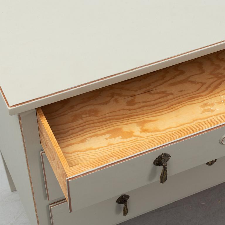 A painted chest of drawers, 1920's/30's.