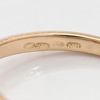 A 14K gold ring with old-cut diamonds.