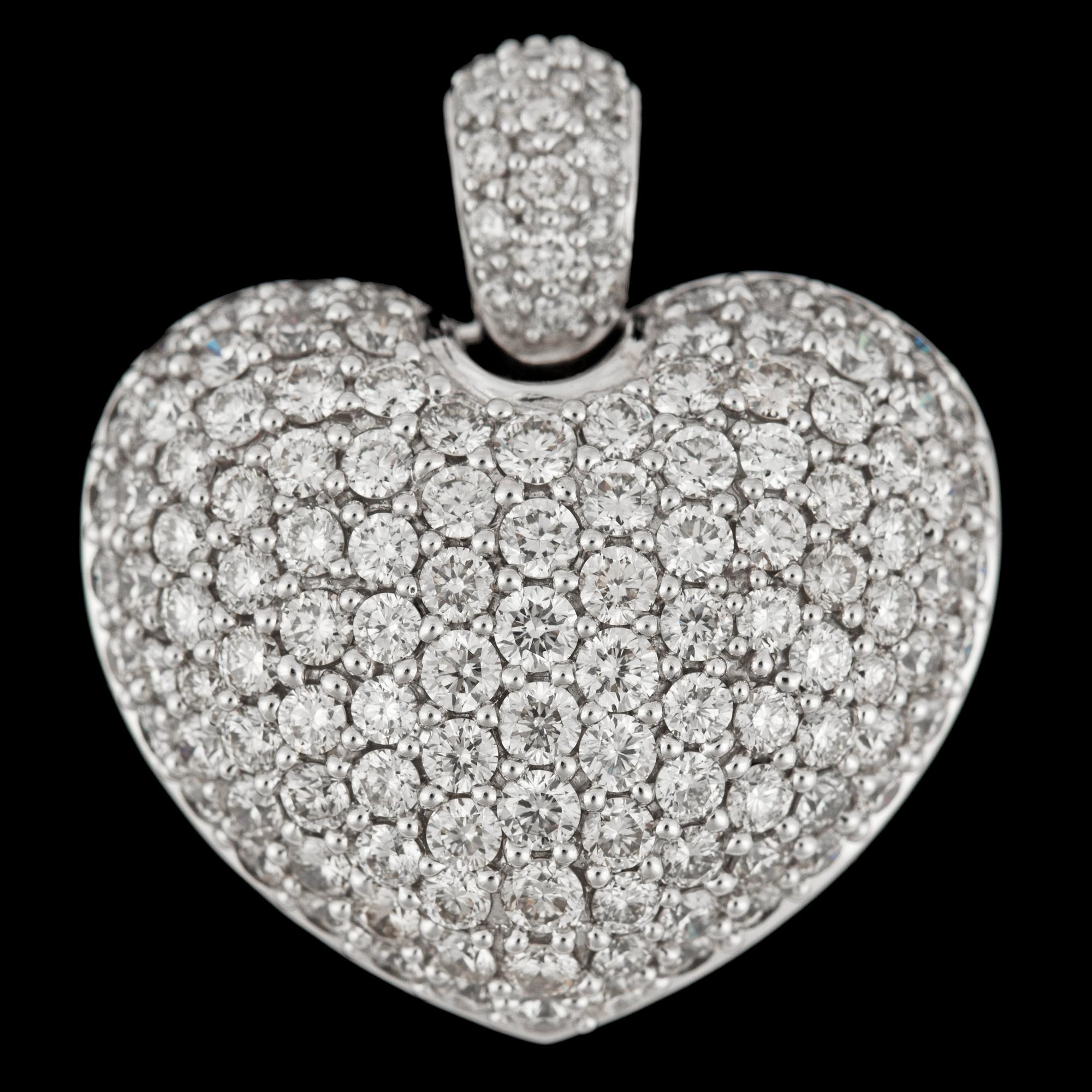 A brilliant cut diamond heart pendant, tot. 2.99 cts.