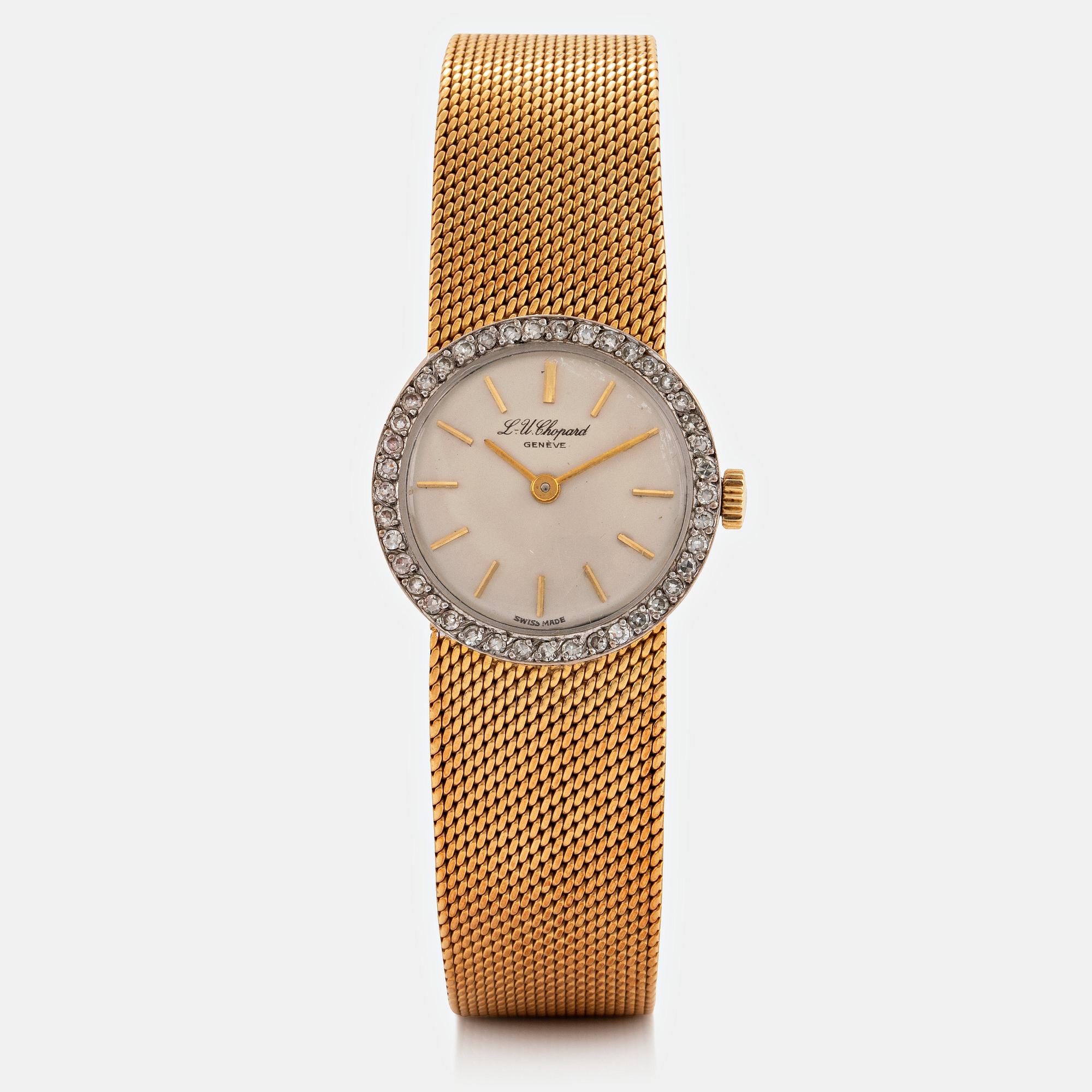 A Chopard wrist watch in 18K gold set with eight-cut diamonds.