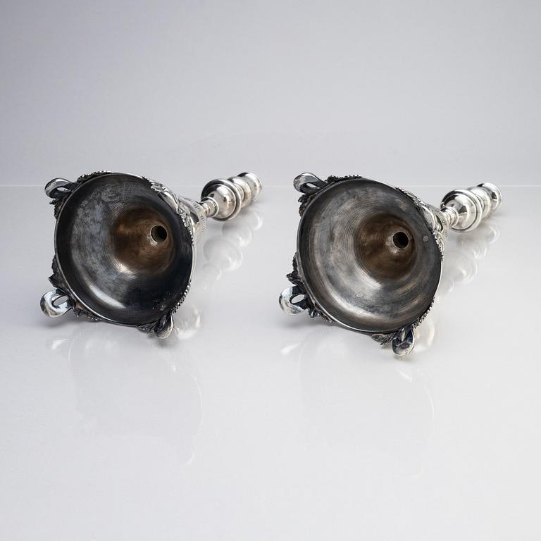 A pair of Swedish 19th century silver candelabra, marks of Gustaf Theodor Folcker, Stockholm 1871.