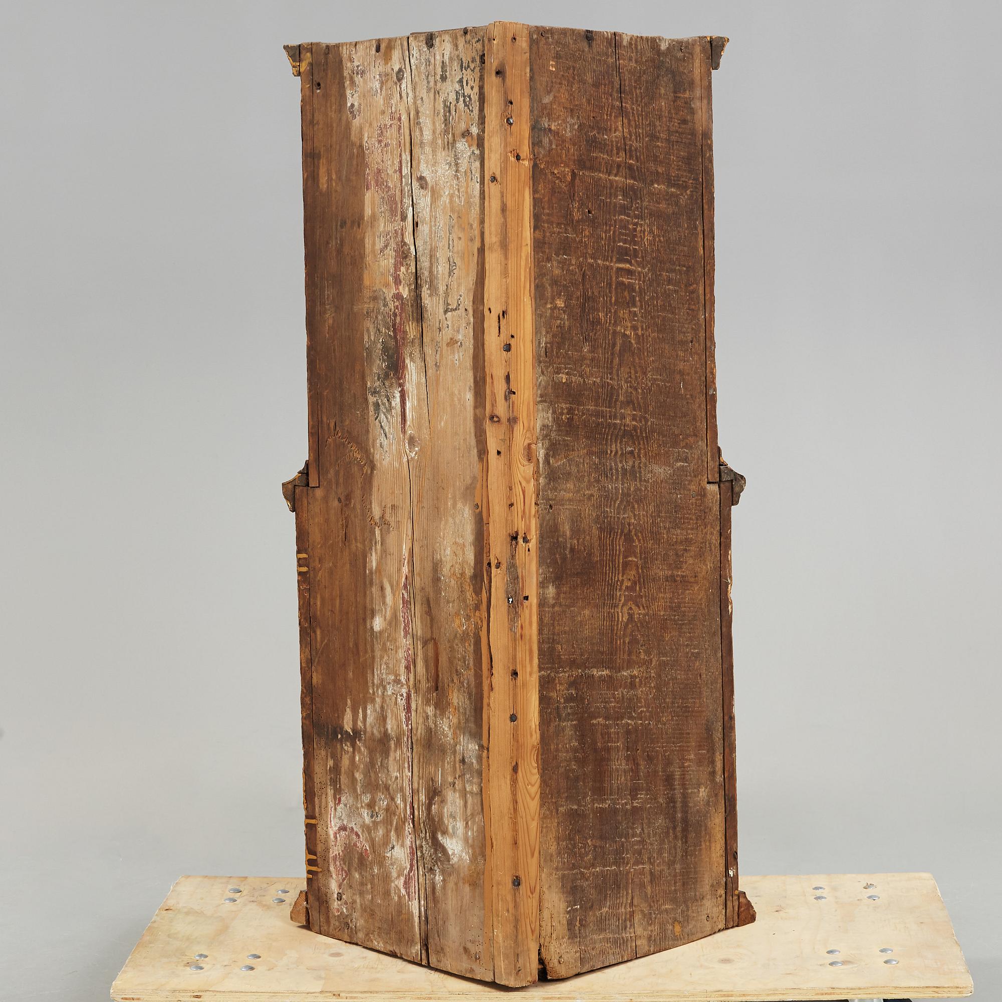 A 18th century corner cabinet.