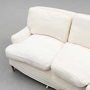 A contemporary Howard sofa.