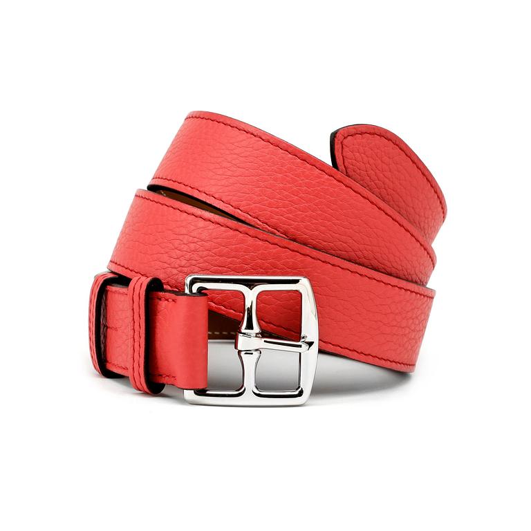 HERMÈS, a pink coral leather belt, "Etrivière".