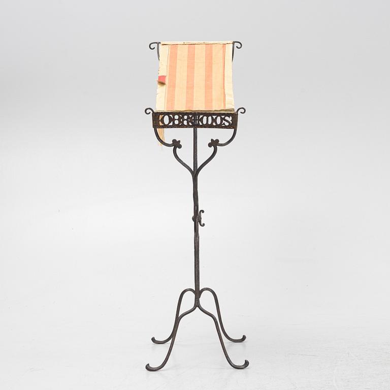 An iron book stand early 20th Century.