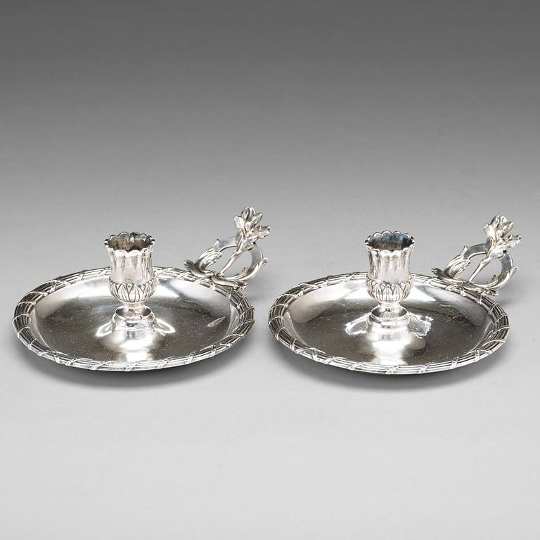 A pair of Swedish 18th century silver chamber-candlesticks, mark of Isak Sauter, Stockholm 1772.