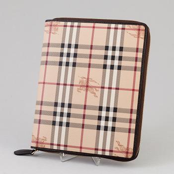 An ipad case by Burberry.