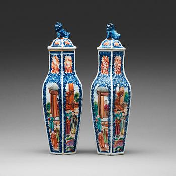 199. A pair of famille rose and underglaze blue vases with covers, Qing dynasty, Qianlong (1736-95).