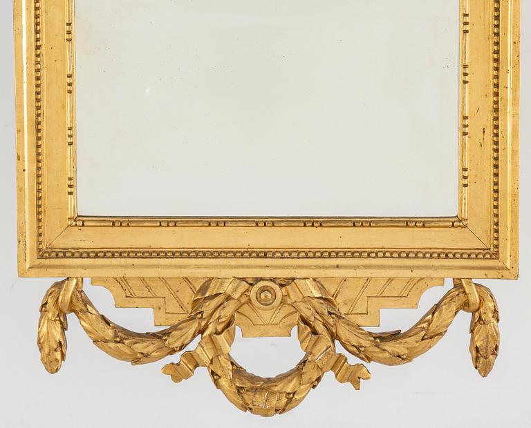 A Gustavian mirror, late 18th century.