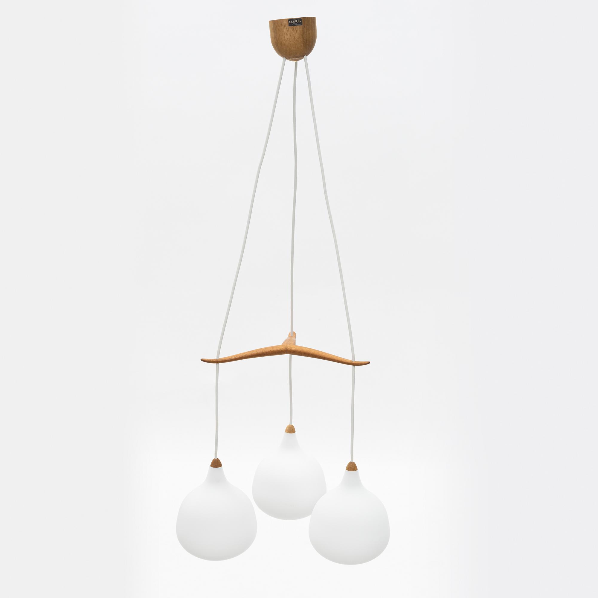 Uno & Östen Kristiansson, an oak and glass ceiling light, Luxus, Vittsjö.