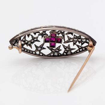 Fabergé, An "Ice" brooch made of silver platinum, gold with rose-cut diamonds and rubies. Designed by Alma Pihl.