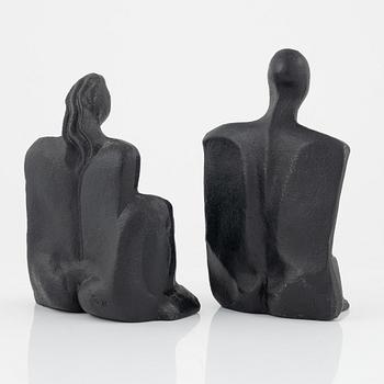 Marita Norin, skulpurer/bokstöd, ett par, monogramsignerade.