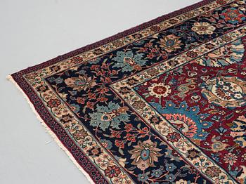 A carpet, semi-antique Tabriz, ca 413,5 x 328,5 cm.