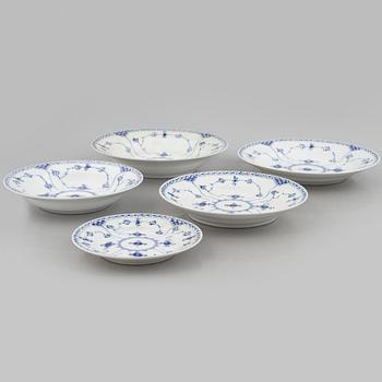 Royal Copenhagen, a 116-piece 'blue Fluted' porcelain dinner and coffee service, half lace, Denmark, mostly 1923-34.