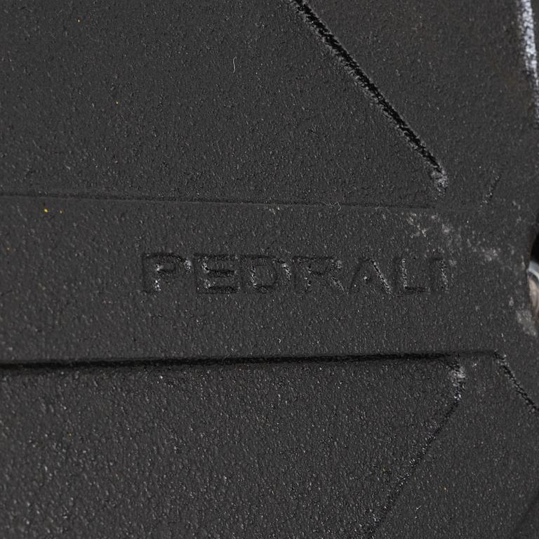 A steel and oak table by Jonas Lindvall 2011.