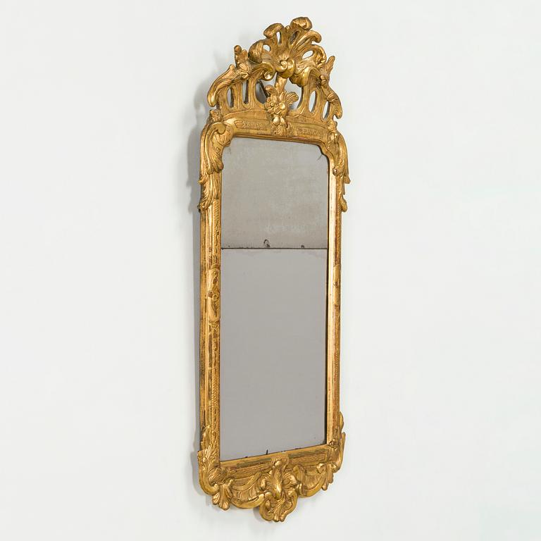 A Rococo giltwood mirror by Nils Meunier (master in Stockholm 1754-97, royal court mirror maker 1769).