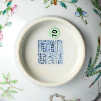 A famille rose 'butterfly' bowl, Qing dynasty with Daoguang mark and of the period (1820-1850).