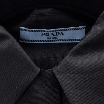 Prada, a black silk blouse, size 36.