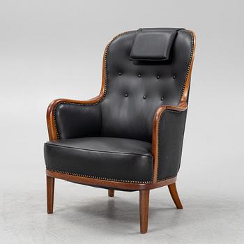 Carl Malmsten, a mahogany 'Advokaten' armchair.