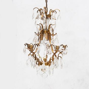 A Rococo style chandelier, mid 20th century.