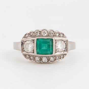 White gold, emerald and  diamond ring.