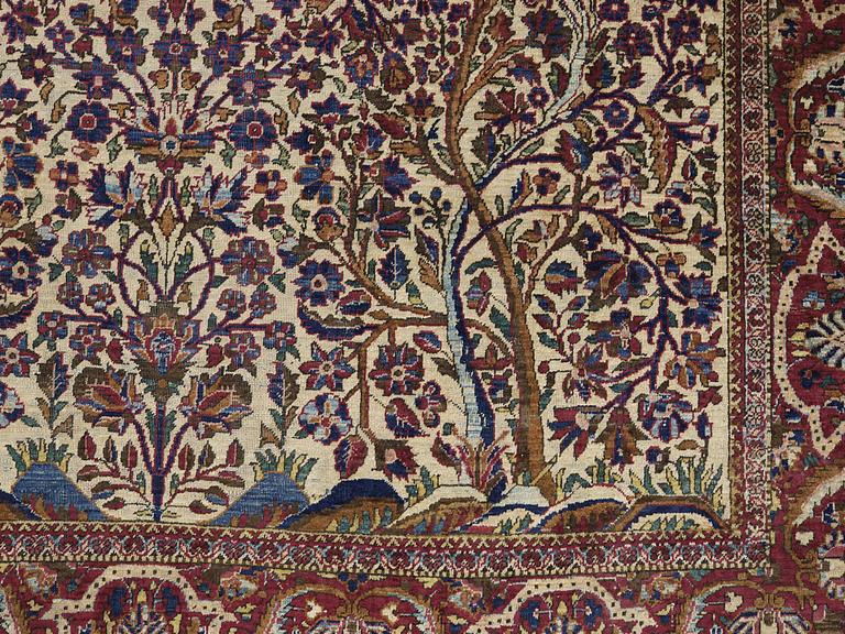 A CARPET, a semi-antique silk Kashan, ca 198,5 x 137 cm.