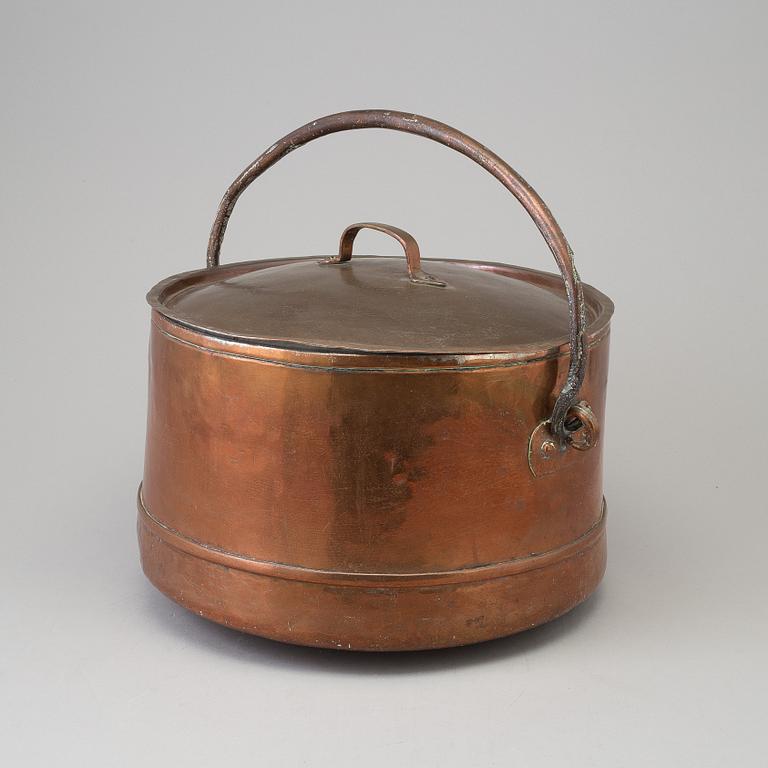 A 18th century copper cauldron.