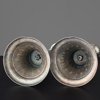 Two similar Gustavian late 18th century candlesticks.